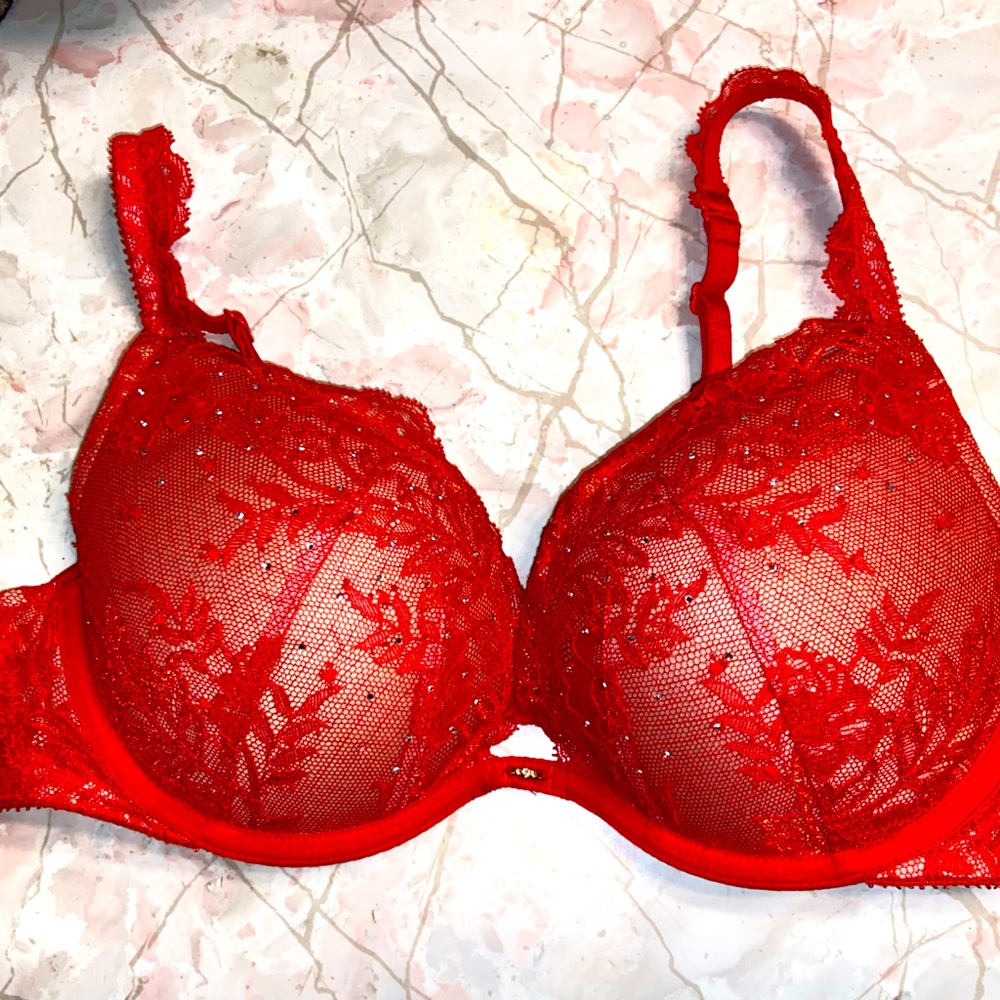 Beautiful red Victoria’s Secret bra with rhinestones and lace detail! Size 34D.
